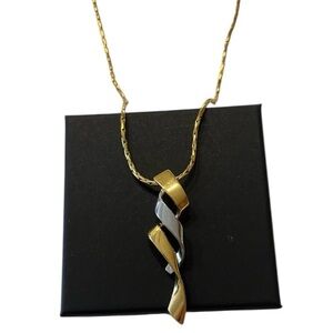 Butler necklace. Spiral design. Unique. Two tone. Stamped